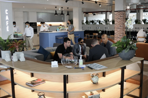 people meeting at rakez compass coworking space